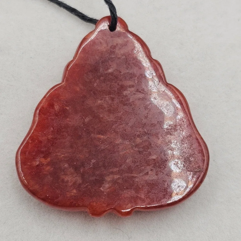 Carved Red Stone Laughing Buddha Pendant Black Cord Necklace Gold Tone Accent
